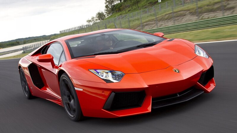 Red Lamborghini on a racetrack