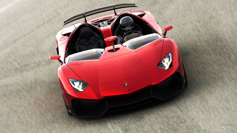 Red Lamborghini on a racetrack