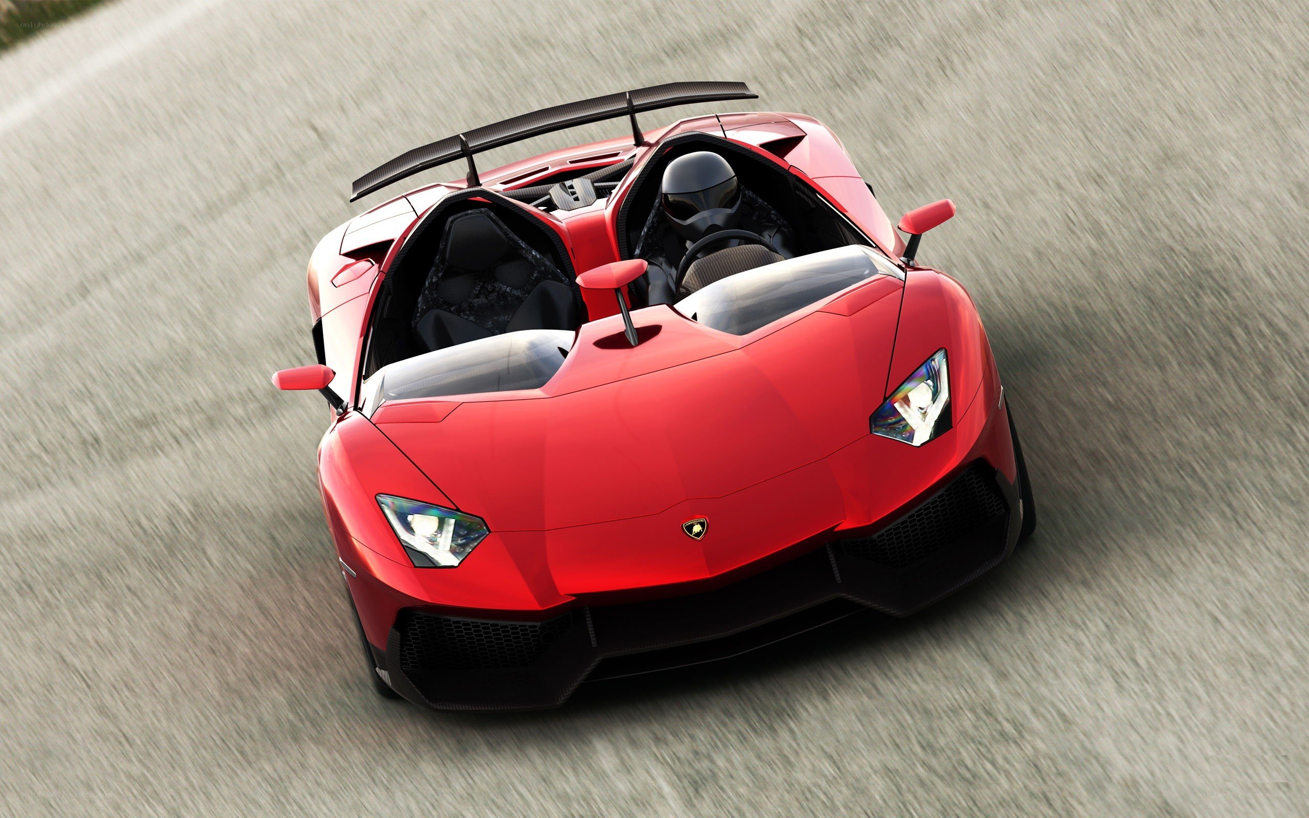 Red Lamborghini on a racetrack