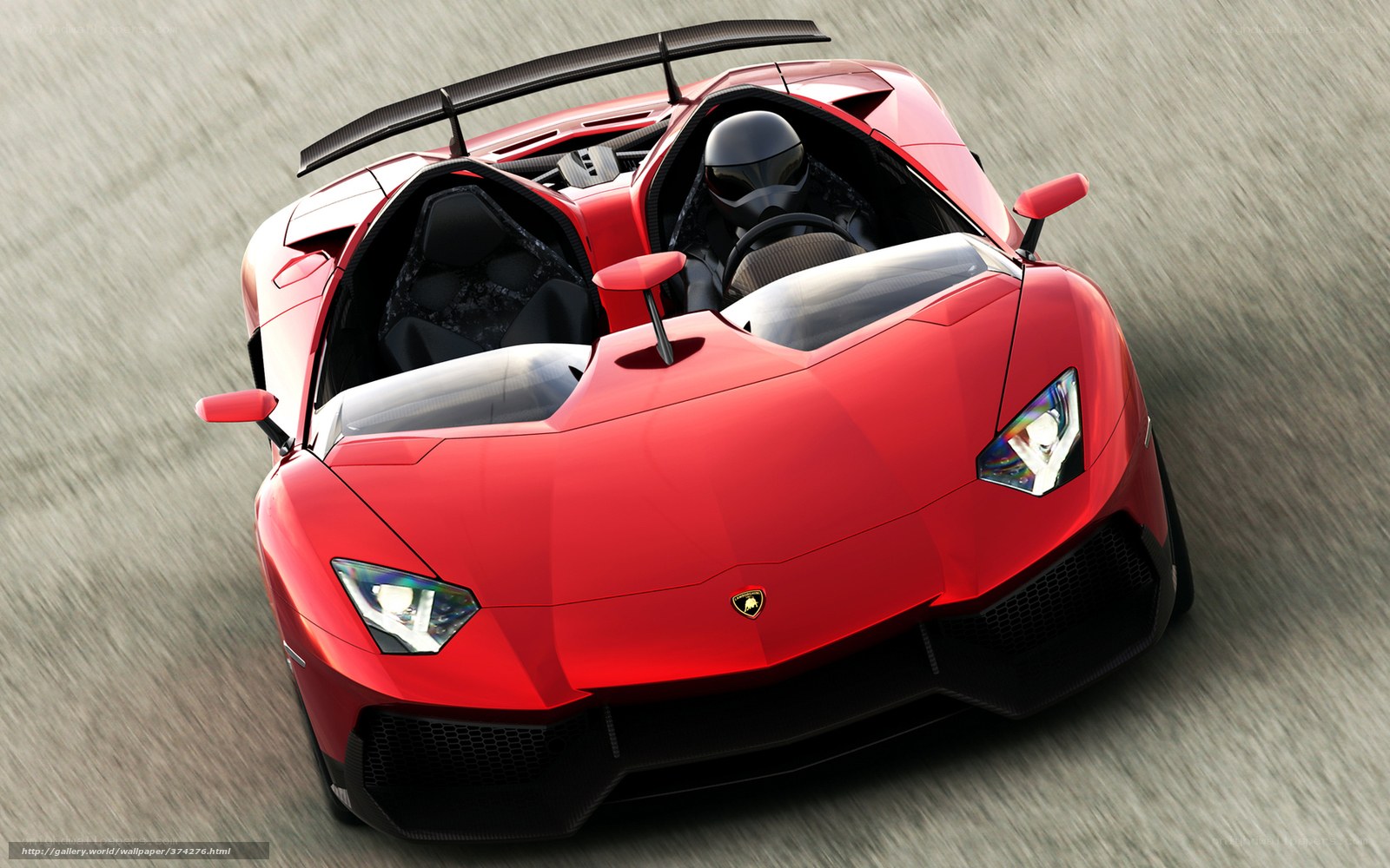 Red Lamborghini on a racetrack