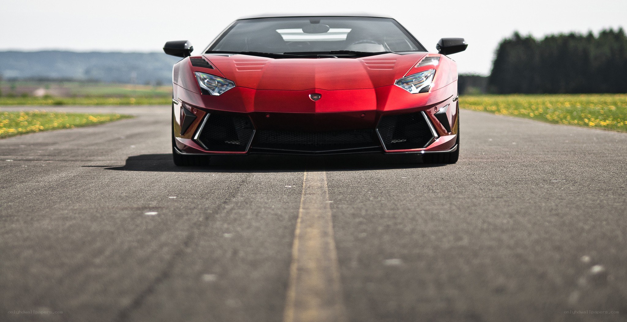 Red Lamborghini on a road