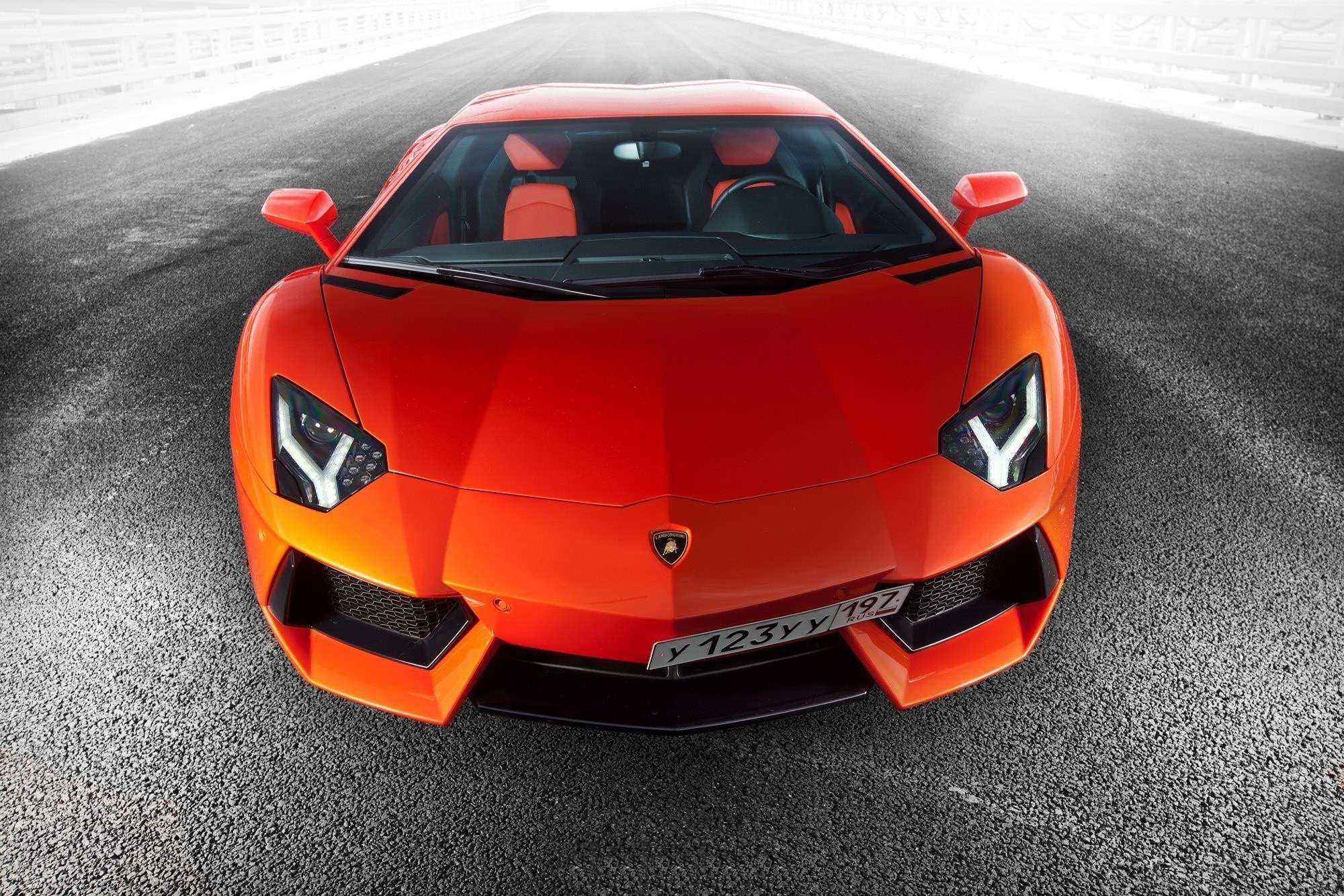 Red Lamborghini on a road