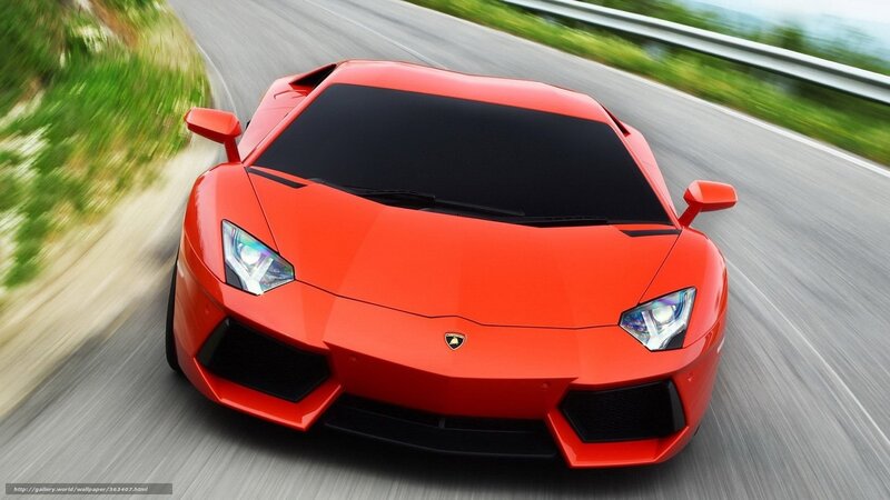 Red Lamborghini on a winding road