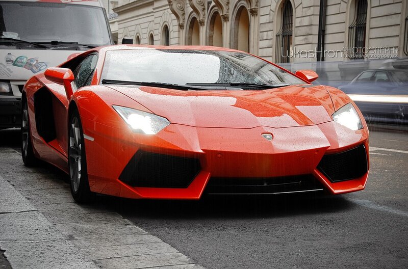 Red Lamborghini on city street