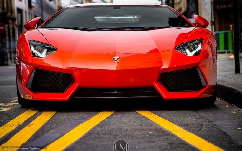 Red Lamborghini on city street