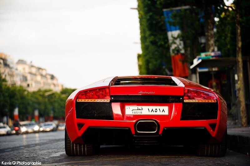 Red Lamborghini on city street