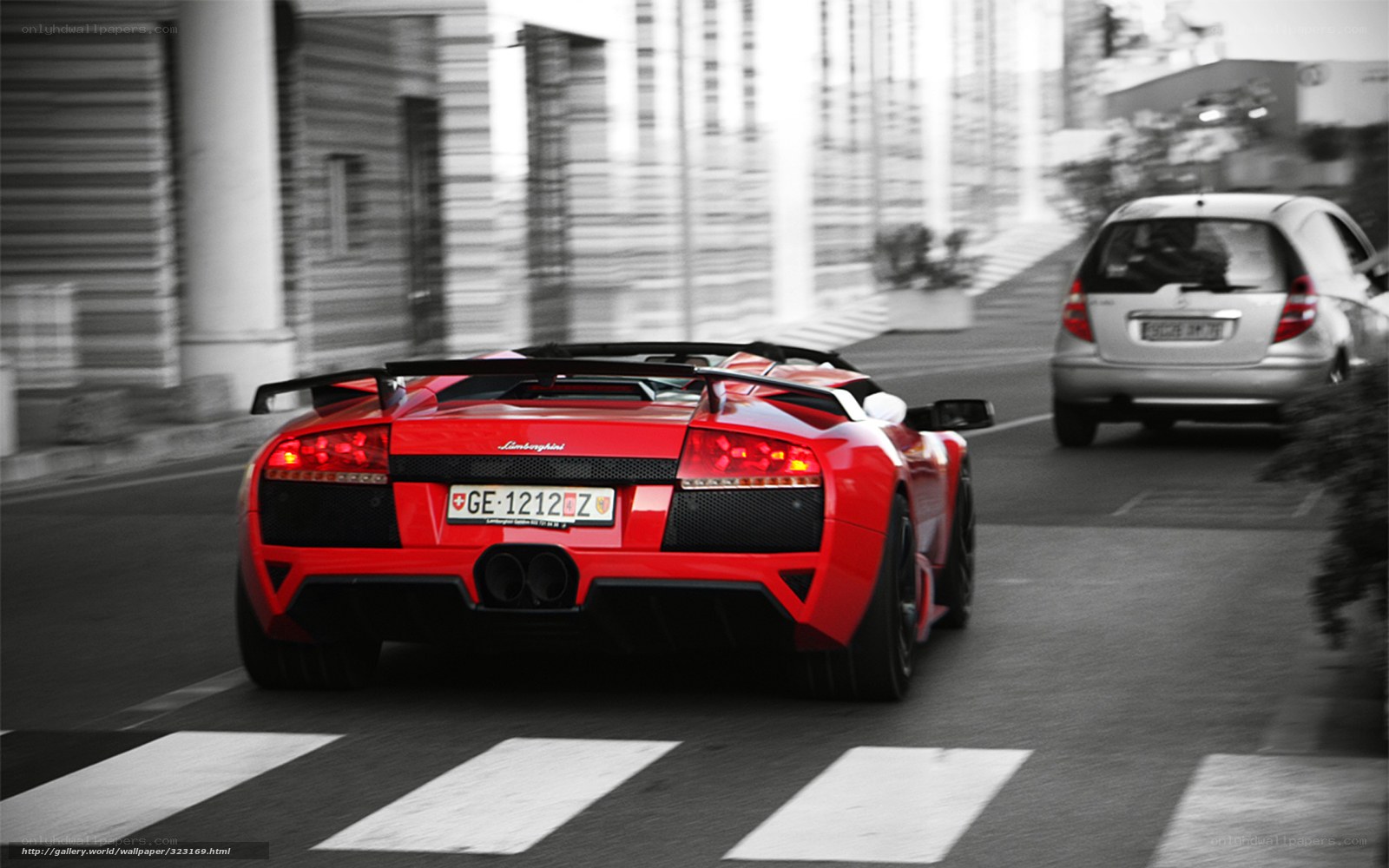 Red Lamborghini on city street