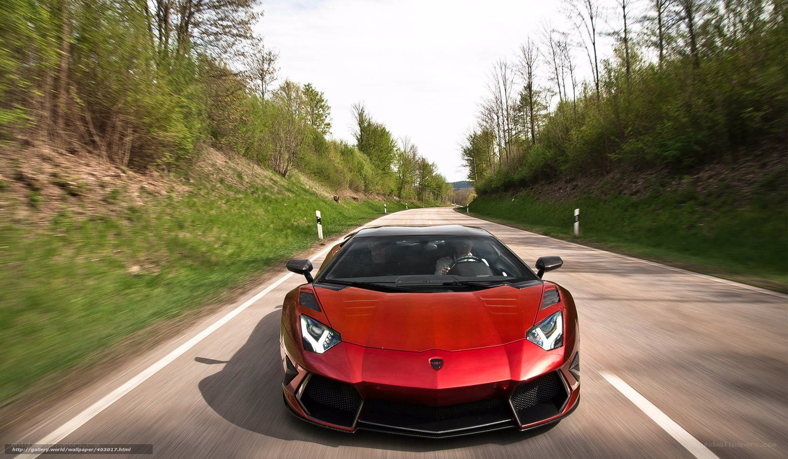 Red Lamborghini on country road