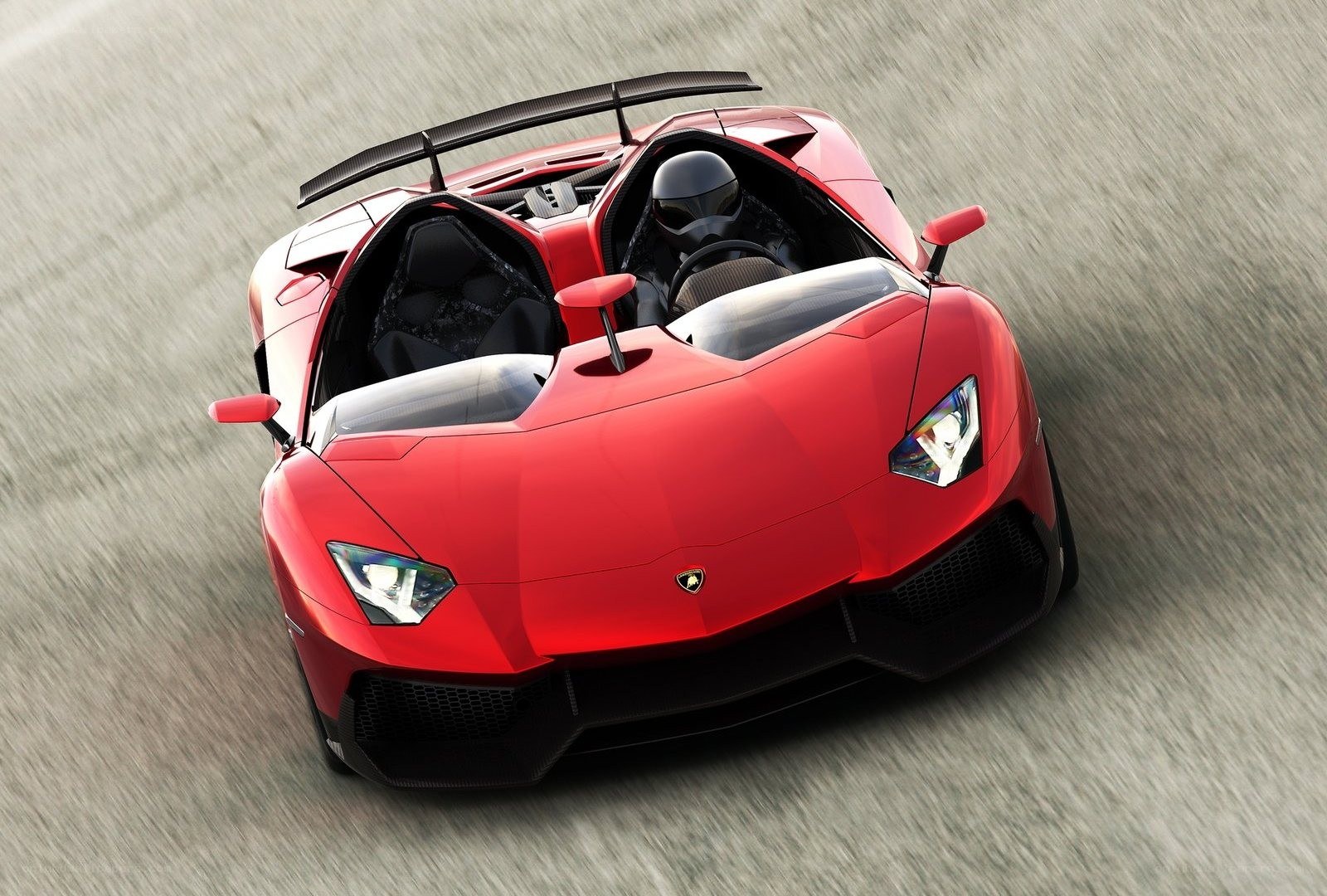Red Lamborghini on racetrack