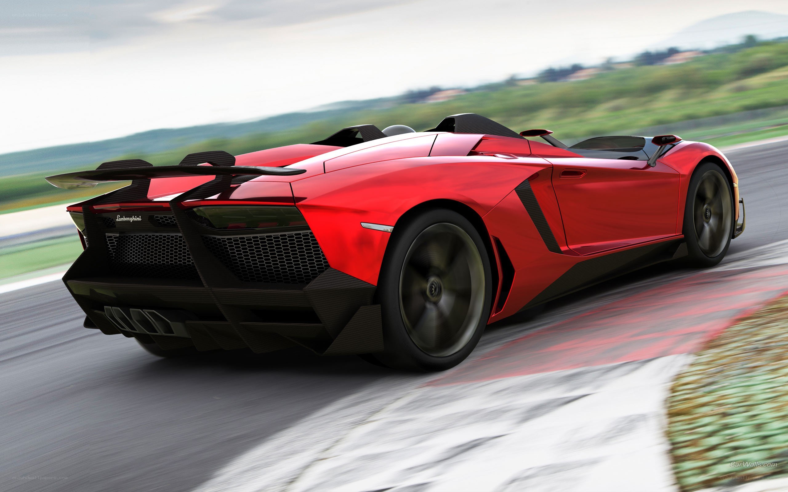 Red Lamborghini on racetrack
