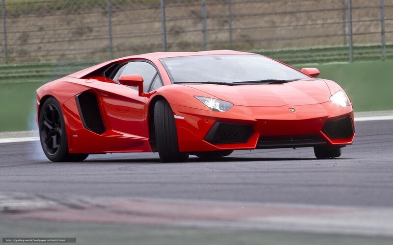 Red Lamborghini on racetrack