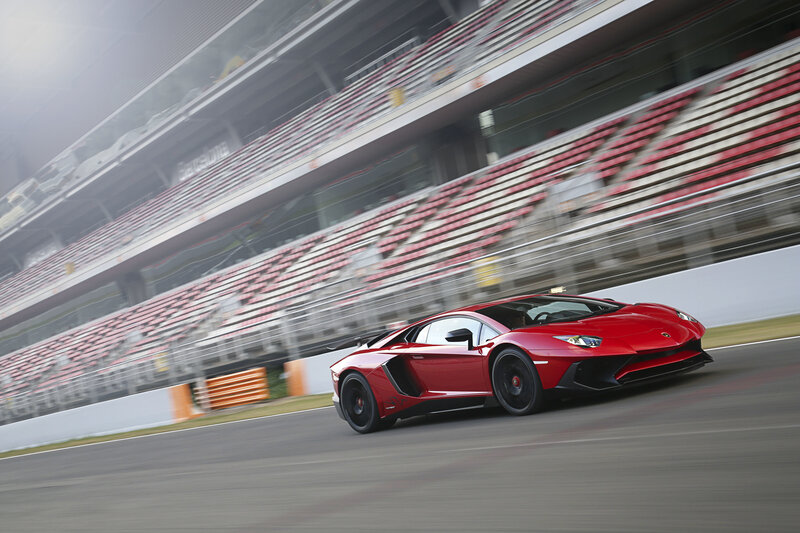 Red Lamborghini on racetrack