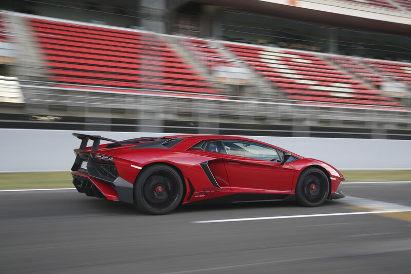 Red Lamborghini on racetrack