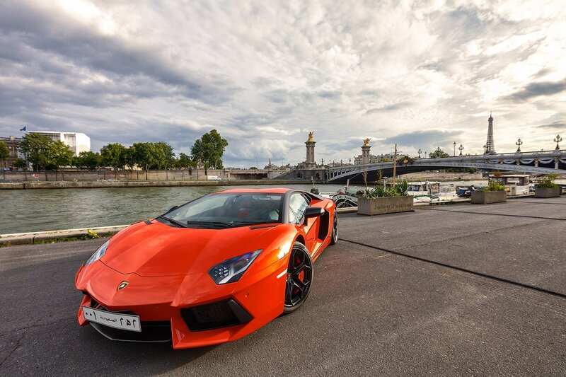Red Lamborghini on Seine River