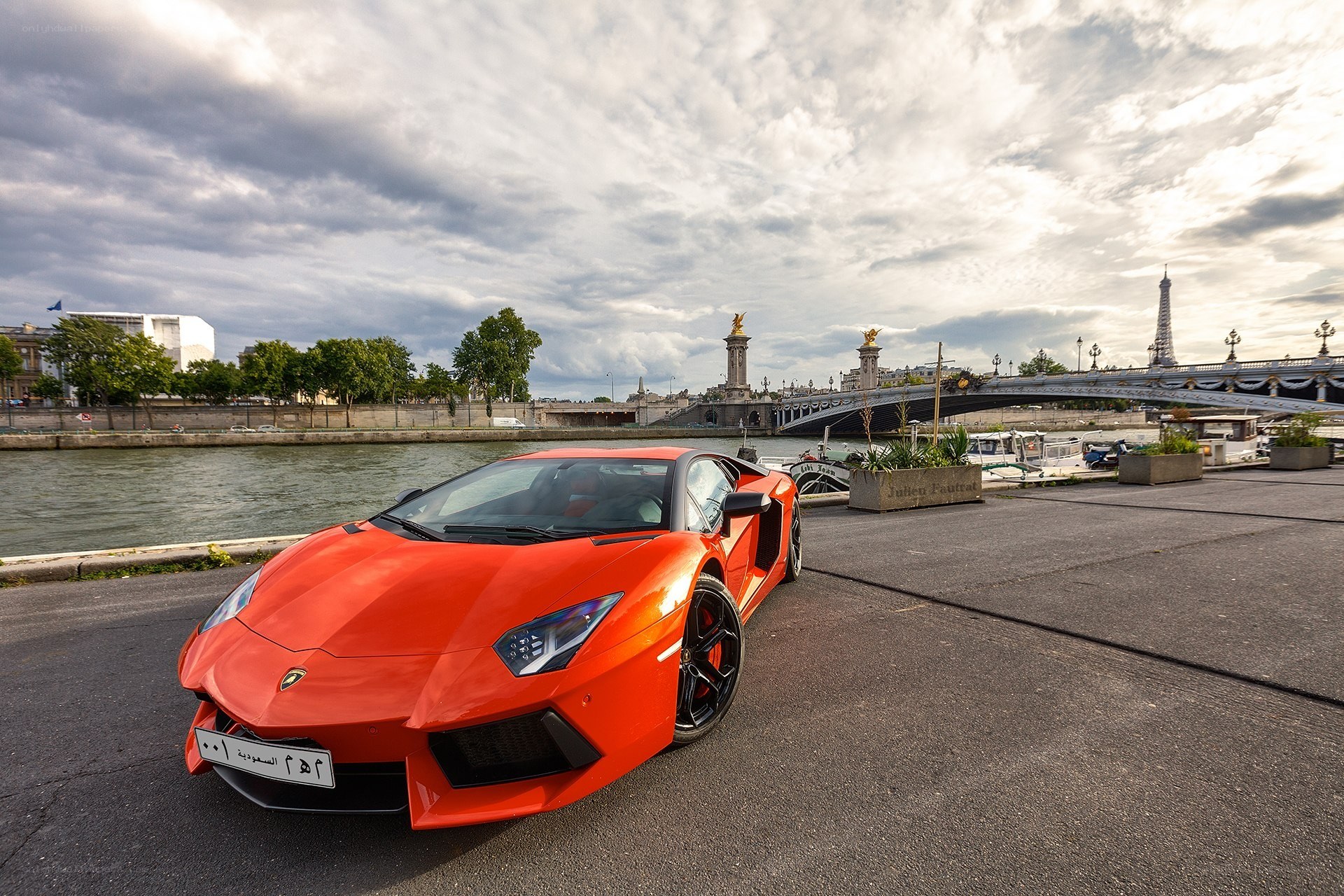 Red Lamborghini on Seine River