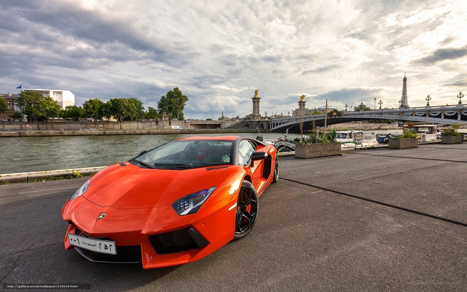 Red Lamborghini on Seine River