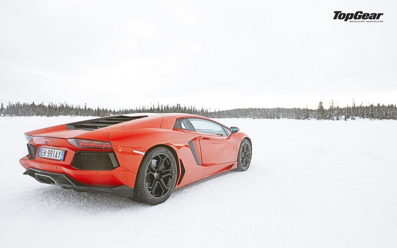 Red Lamborghini on snow