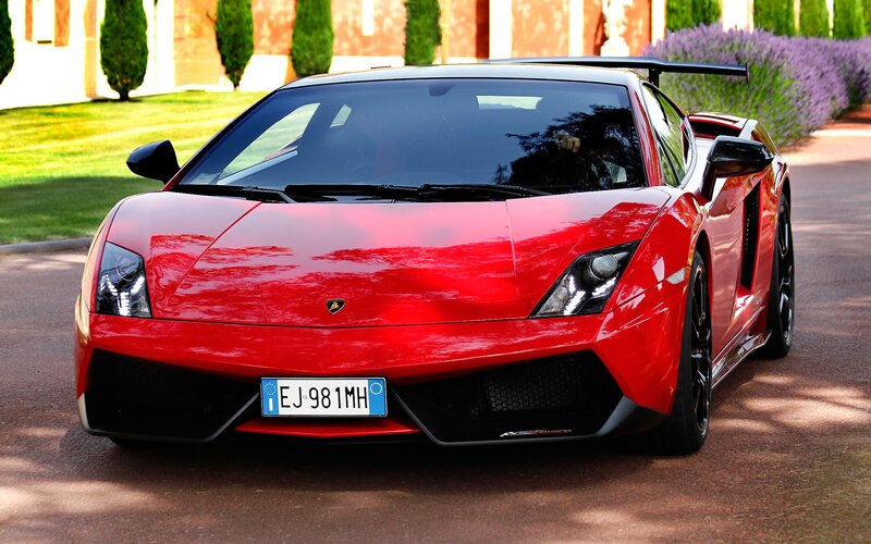 Red Lamborghini Sports Car — Dramatic, Afternoon, Photograph, Road