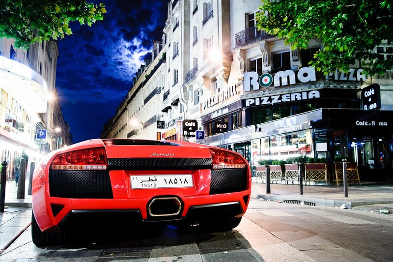 Red Lamborghini Sports Car — Dramatic, Night, Photograph, Pizza Restaurant