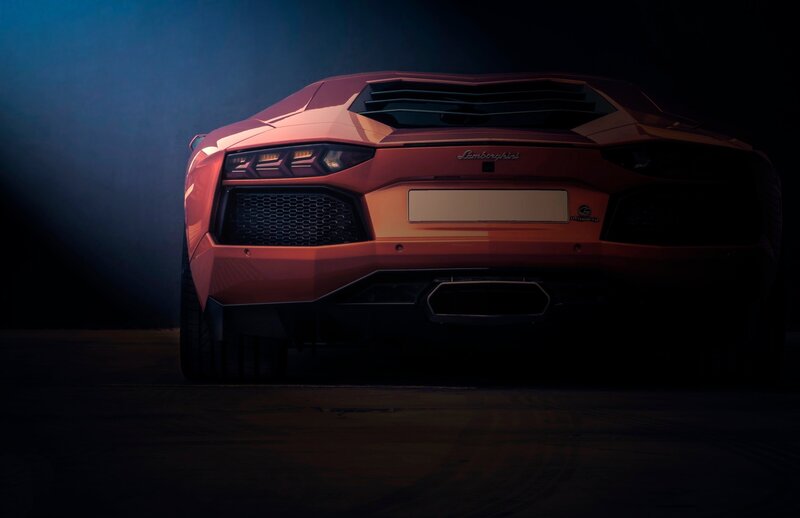 Red Lamborghini Sports Car — Dramatic, Night, Photograph