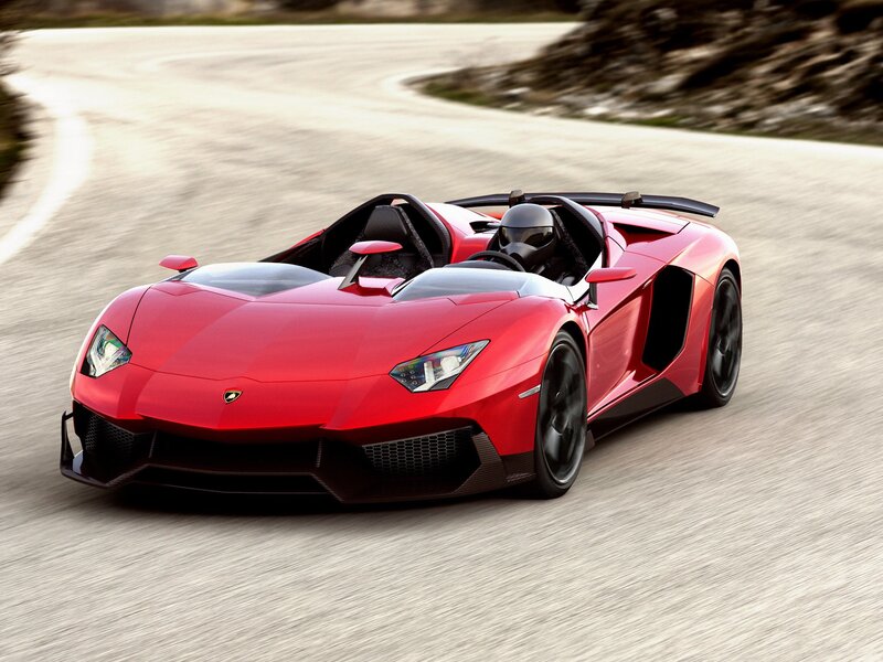 Red Lamborghini sports car on track