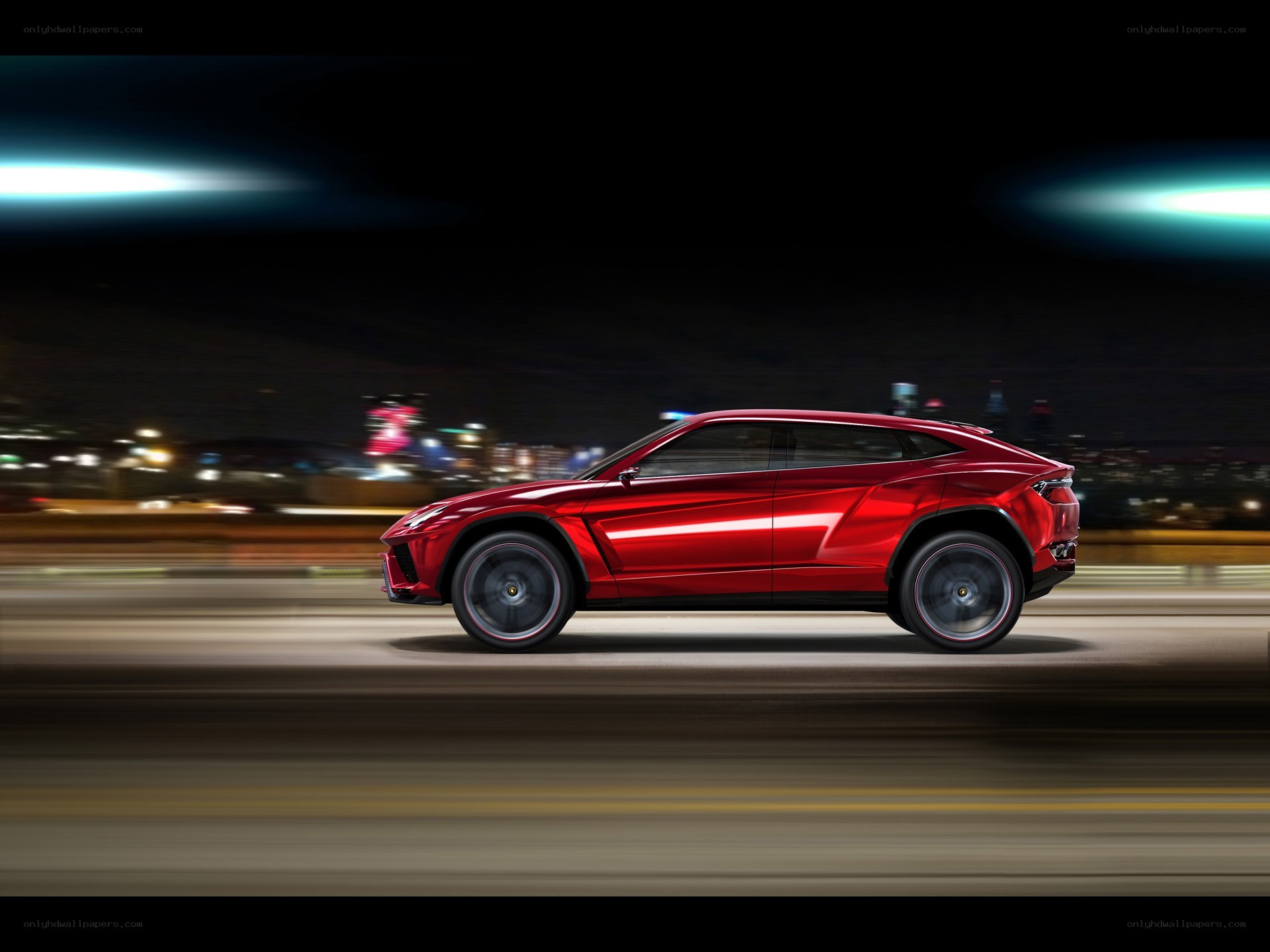 Red Lamborghini SUV at night