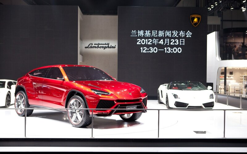 Red Lamborghini SUV — Dramatic, Photograph