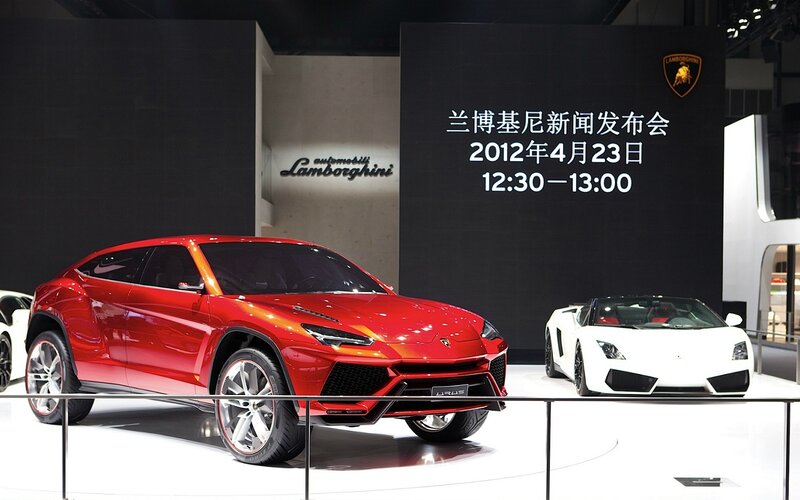 Red Lamborghini SUV — Dramatic, Photograph, White Sports Car