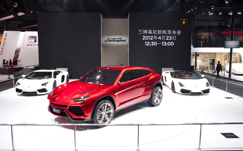 Red Lamborghini SUV — Dramatic