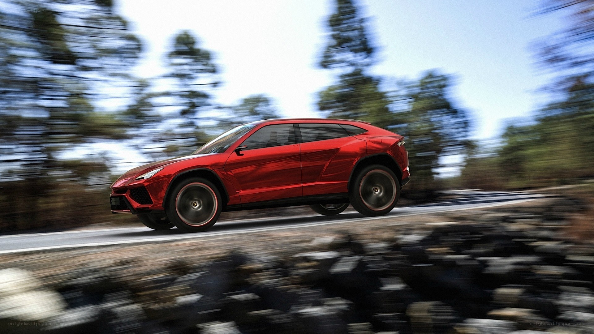 Red Lamborghini SUV in motion