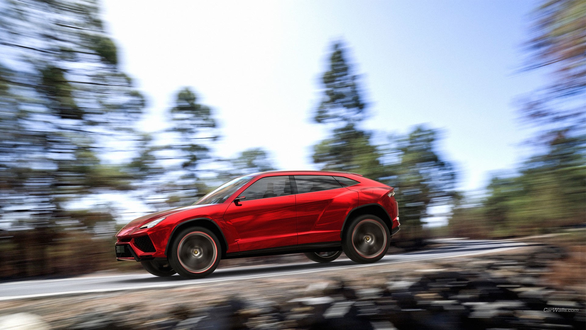 Red Lamborghini SUV in motion
