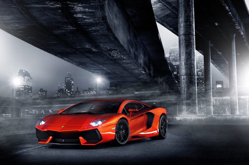 Red Lamborghini under highway