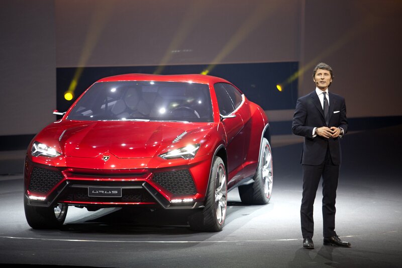 Red Lamborghini Urus — Dramatic, Photograph, Man in Suit, Car