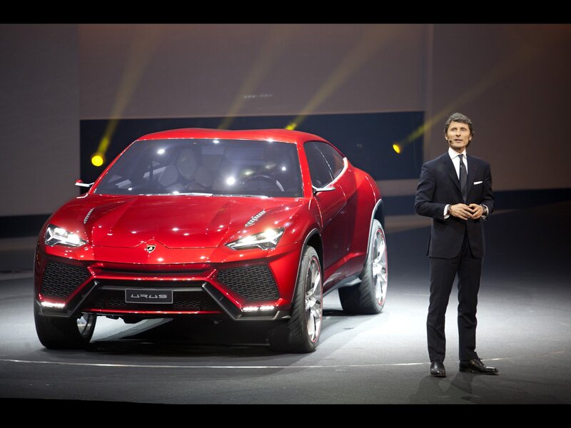 Red Lamborghini Urus — Dramatic, Photograph, Man in Suit