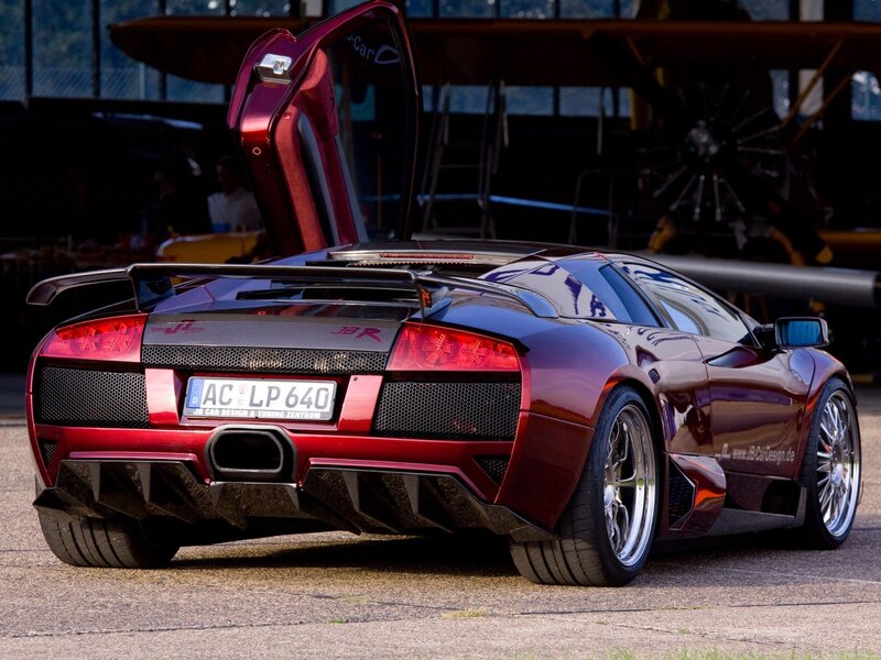 Red Lamborghini with open door