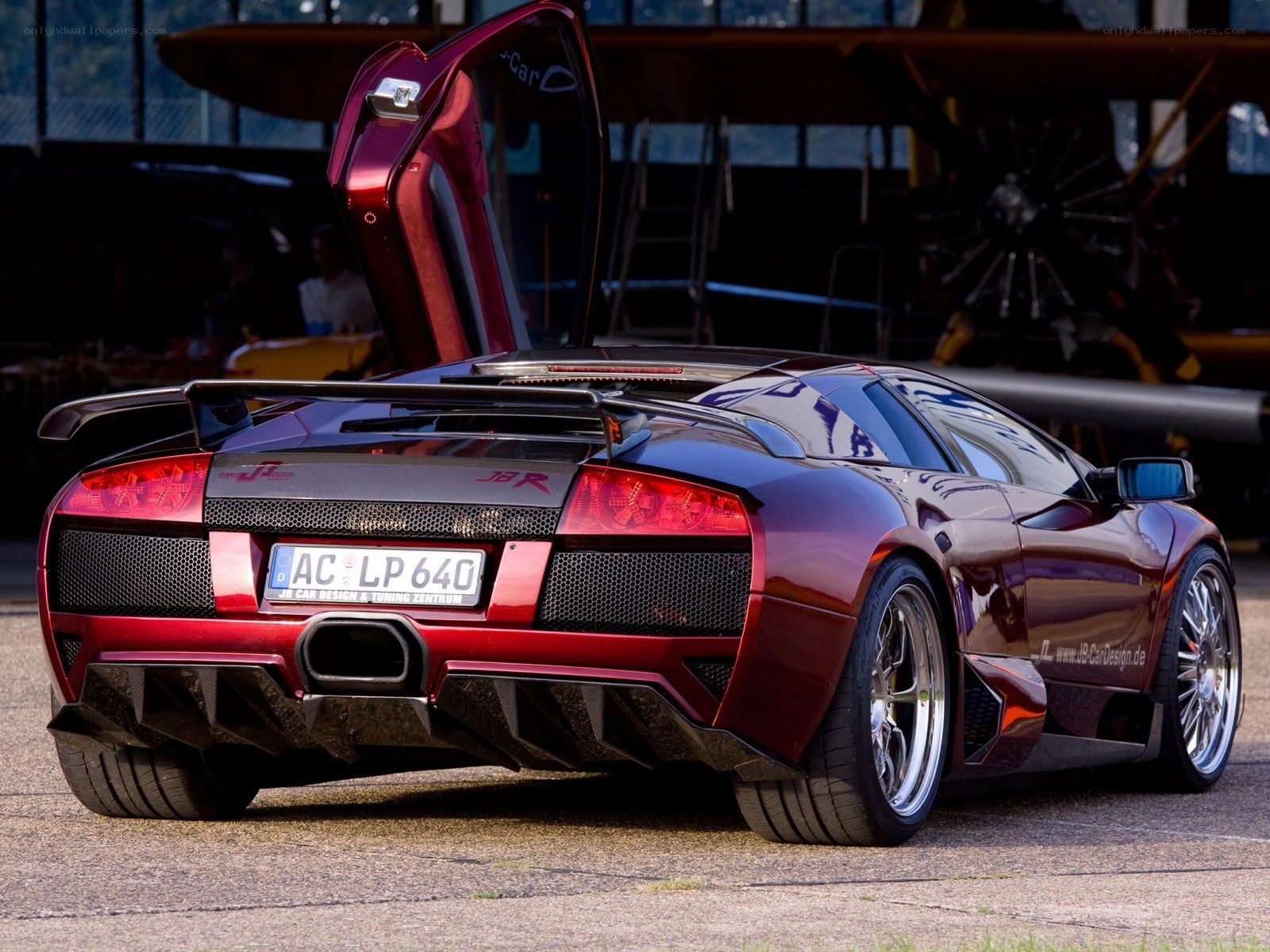 Red Lamborghini with open door