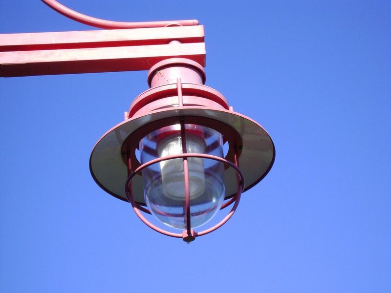 red lamp against blue sky