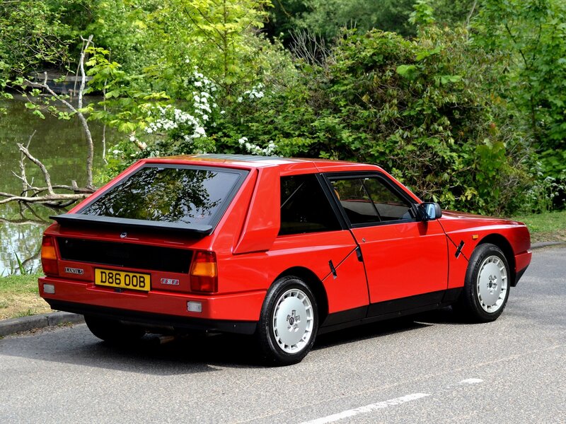 Red Lancia Delta — Serene, Spring