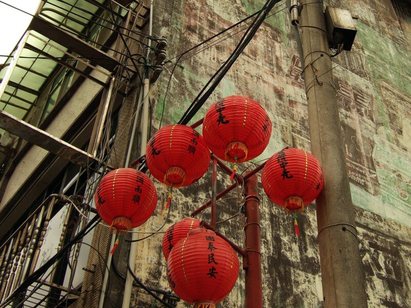 Red lanterns in an alley