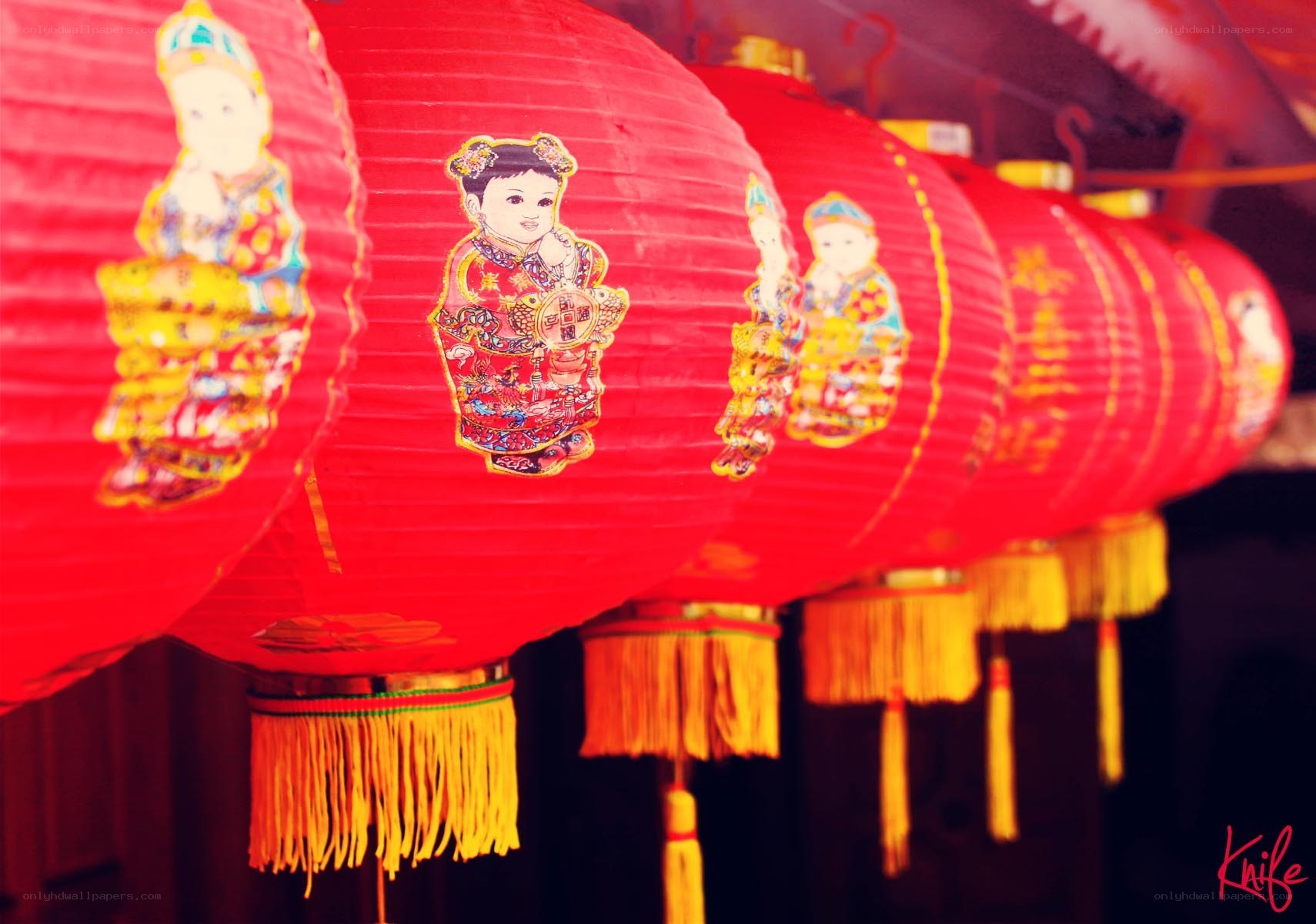 Red lanterns with children decorations