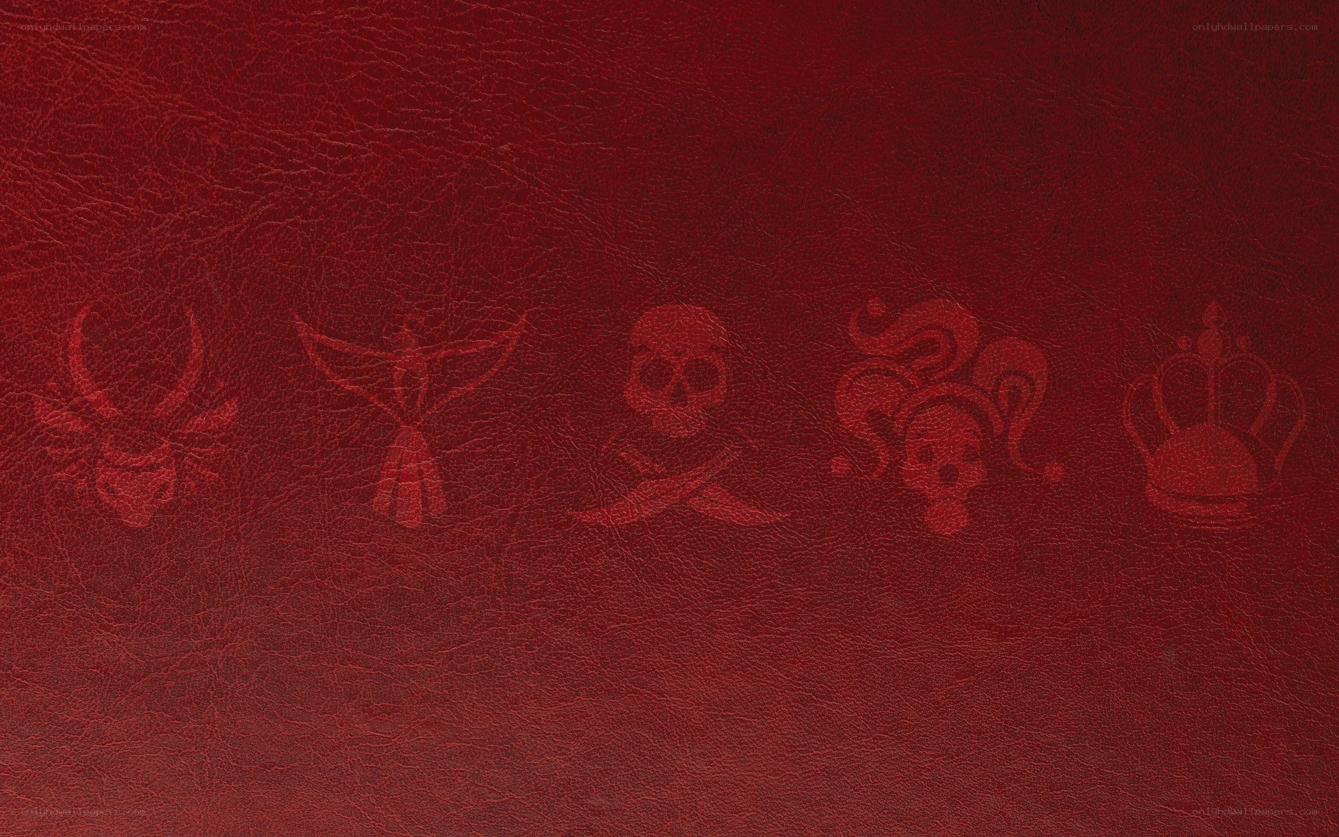 red leather with embossed symbols