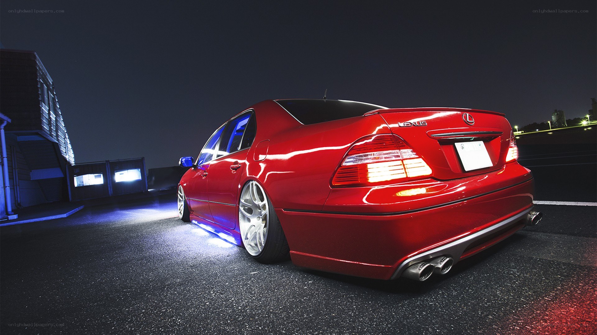 red lexus at night