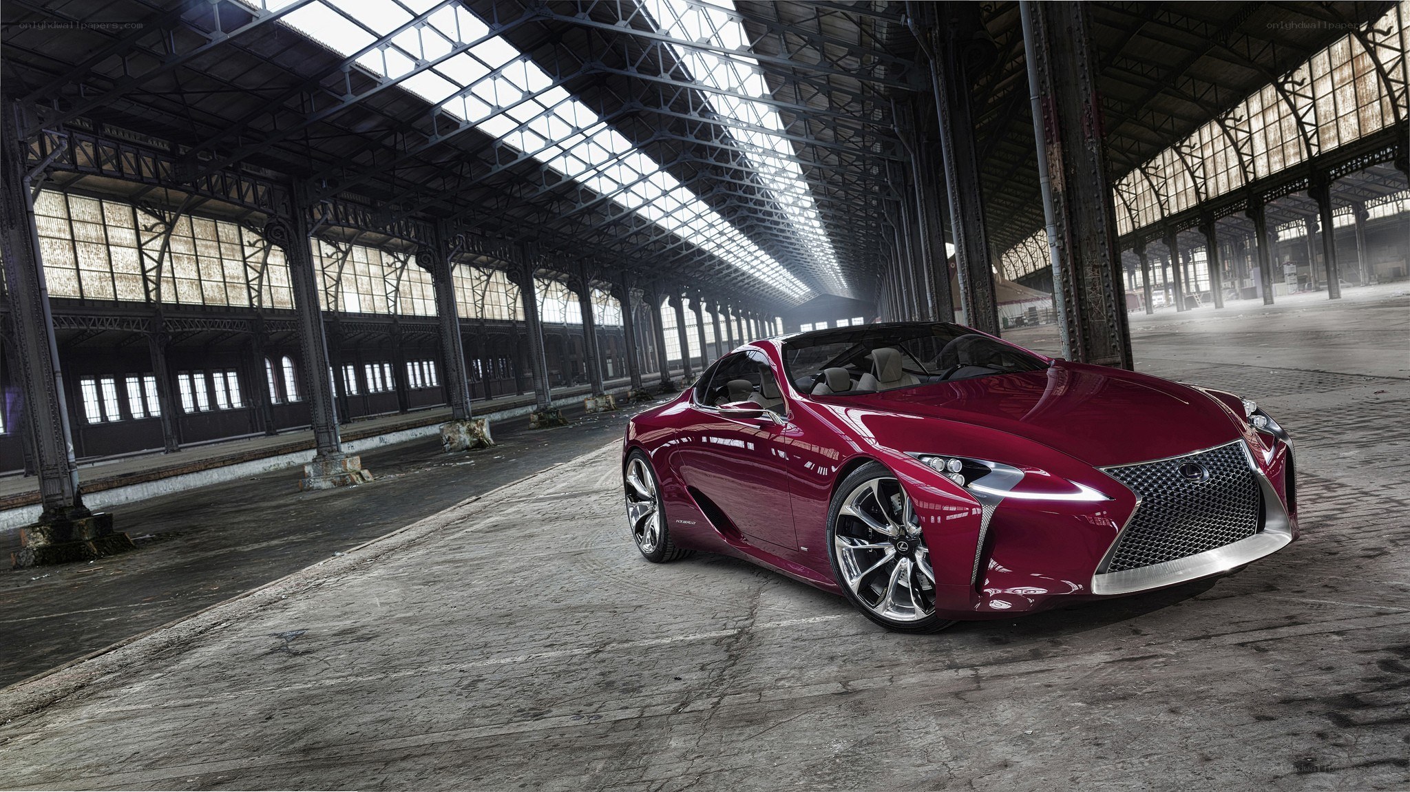 Red Lexus concept car in warehouse