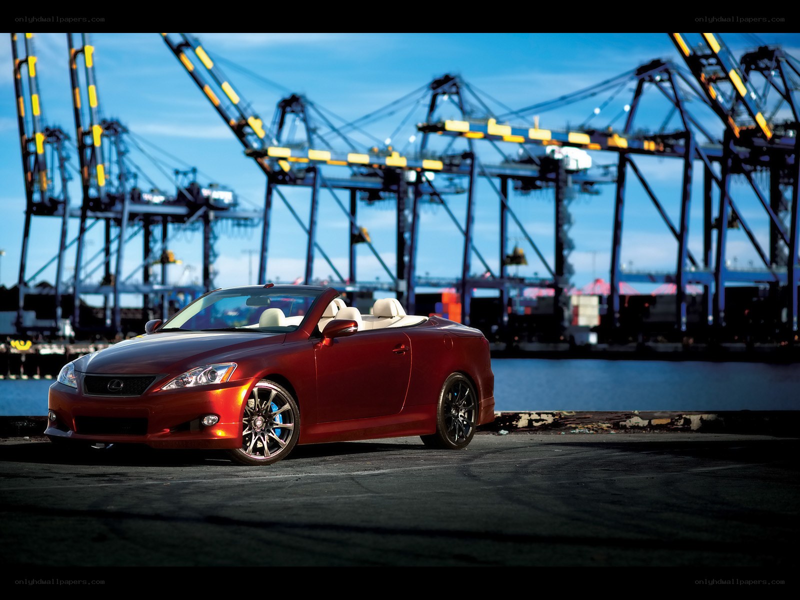Red Lexus convertible at port