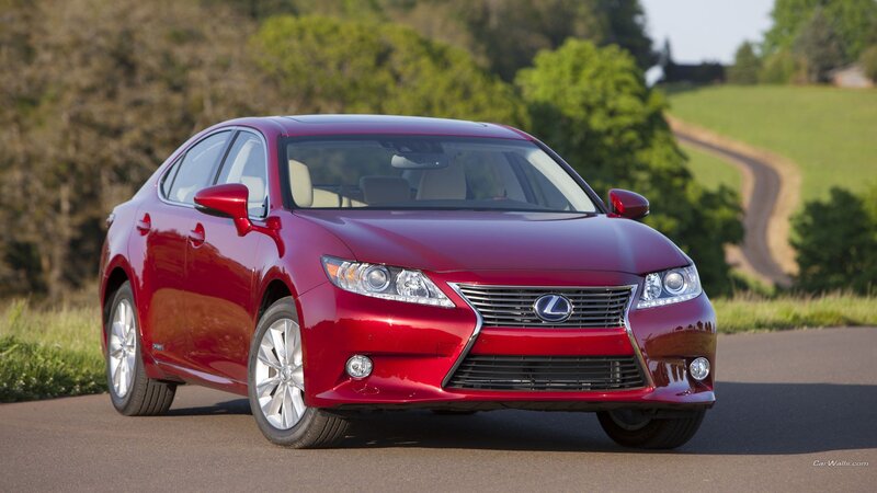 Red Lexus ES sedan on country road
