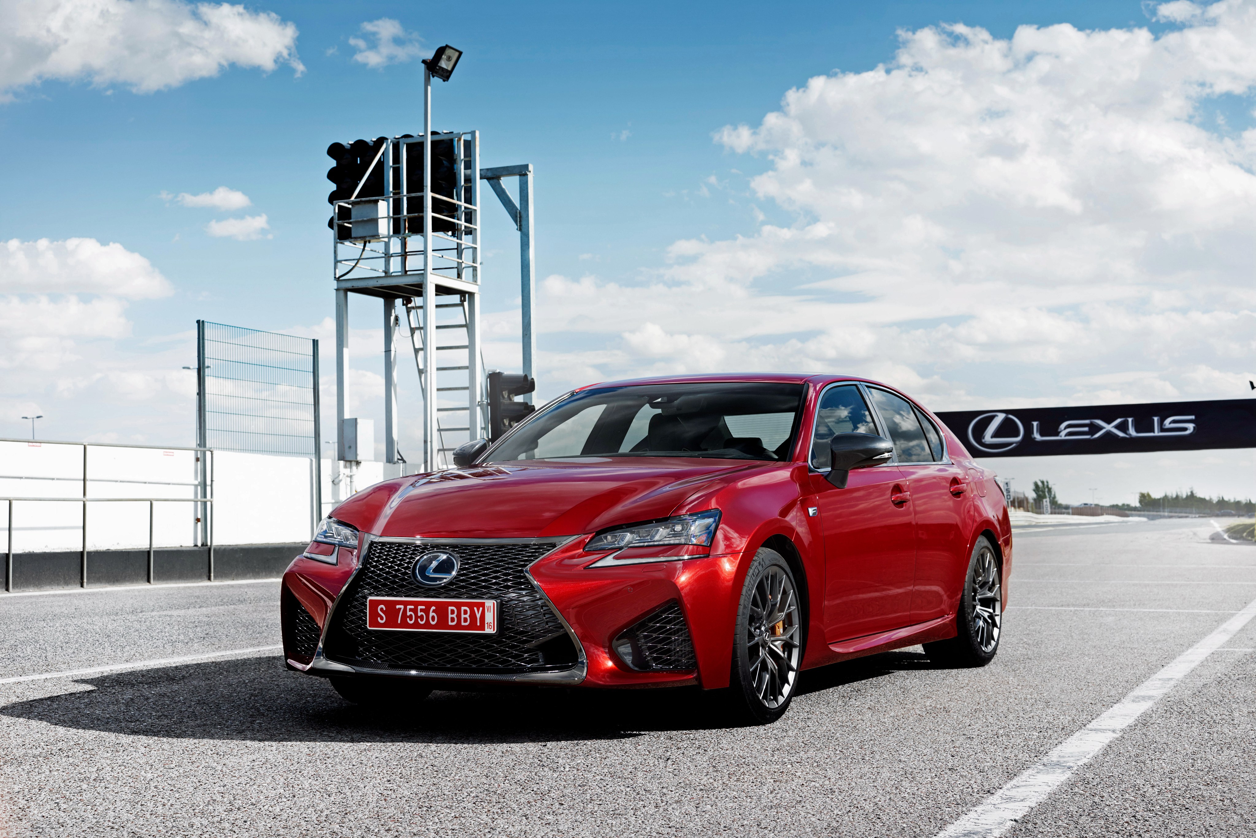Red Lexus GS F on racetrack