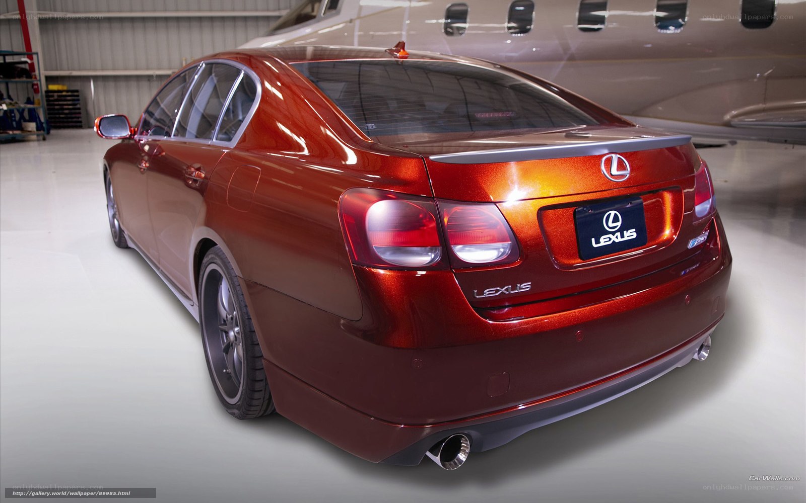 Red Lexus GS in hangar
