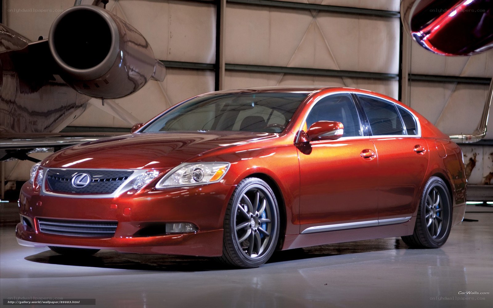 Red Lexus GS in hangar