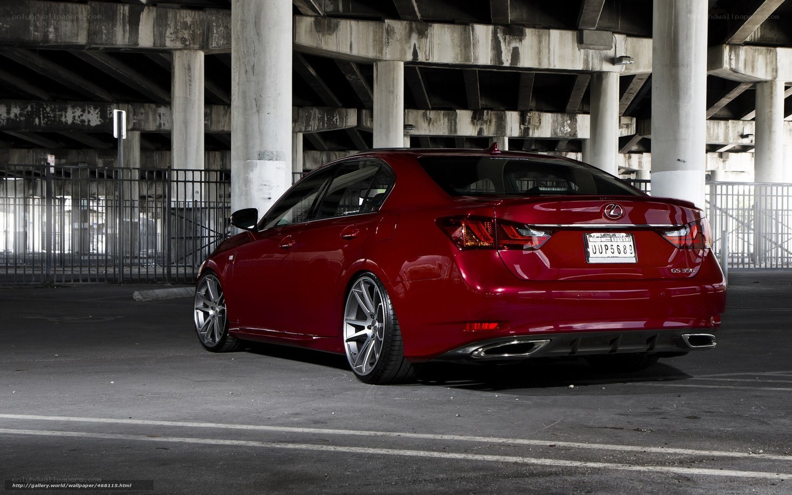 red lexus gs350 under bridge