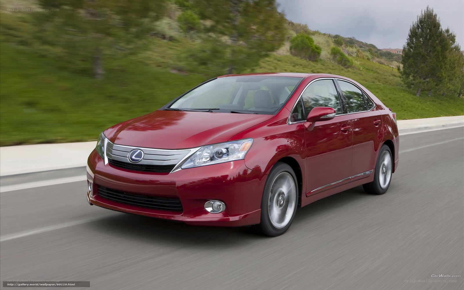 Red Lexus HS 250h in motion